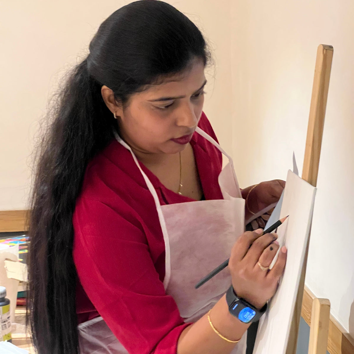 Kriya Art Studio workspace — hand-painted spiritual artwork and Vastu Shastra art studio